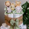 A cake with some animals on top of it