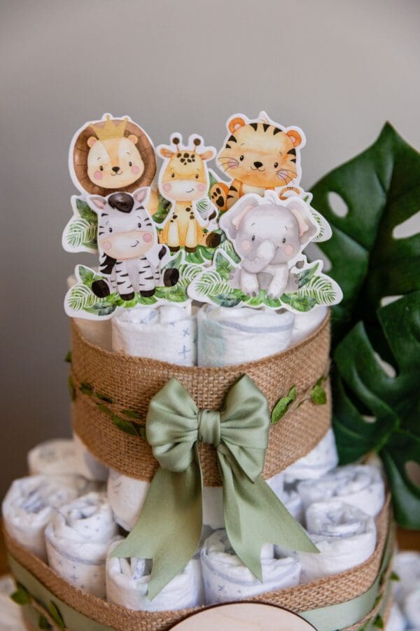 A cake with some animals on top of it