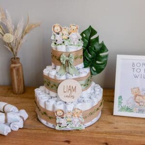 A baby shower cake made of diapers and leaves