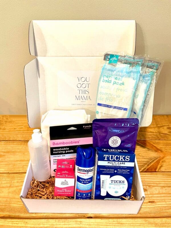 A box of postpartum care products.