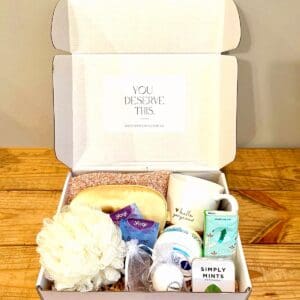 Bath and body products in a white box.