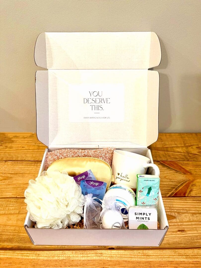 Bath and body products in a white box.